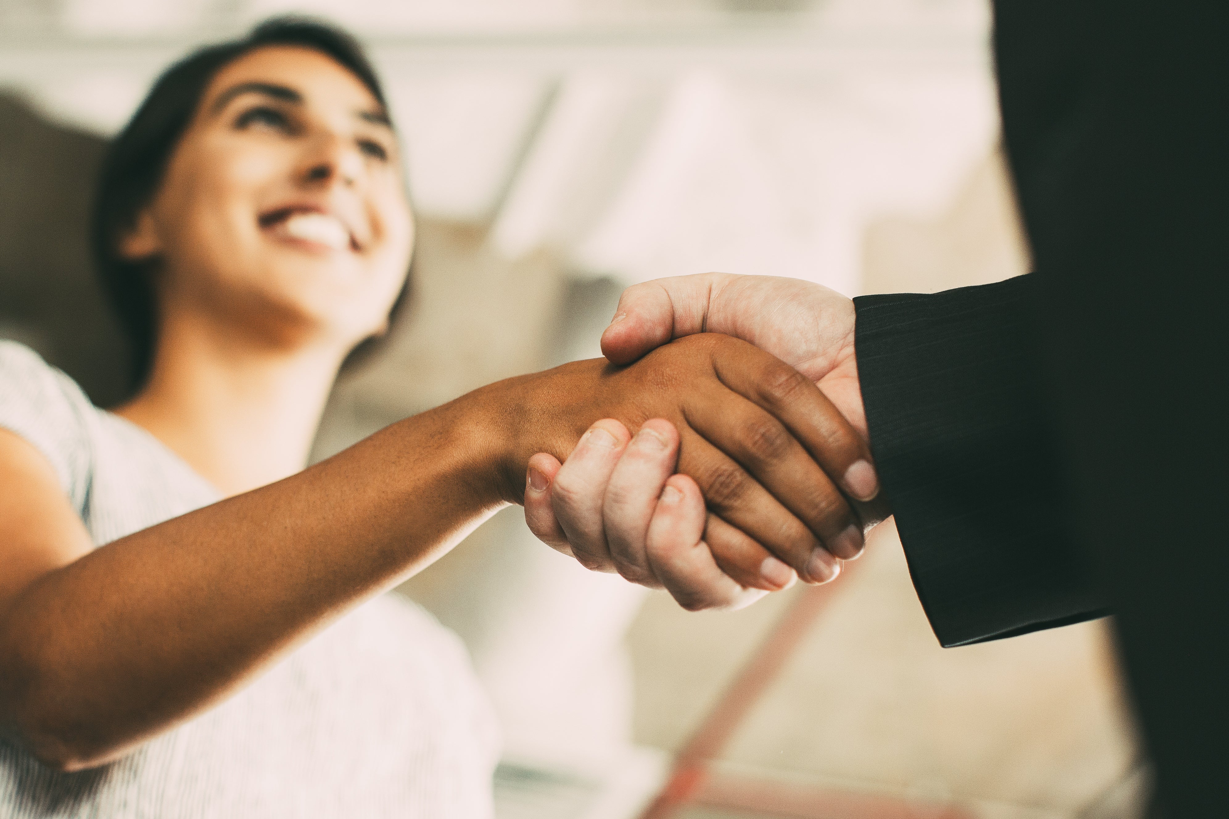 two people shaking hands