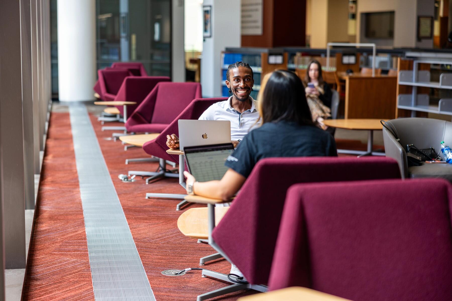 ASU faculty meet in the Law School library