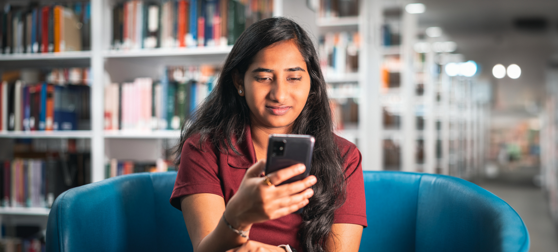 Student holding cell phone