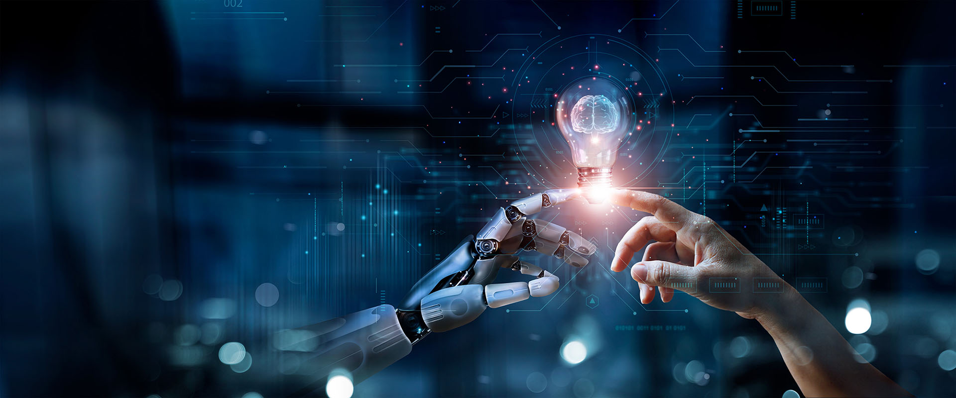 Robot and hand touching a light bulb