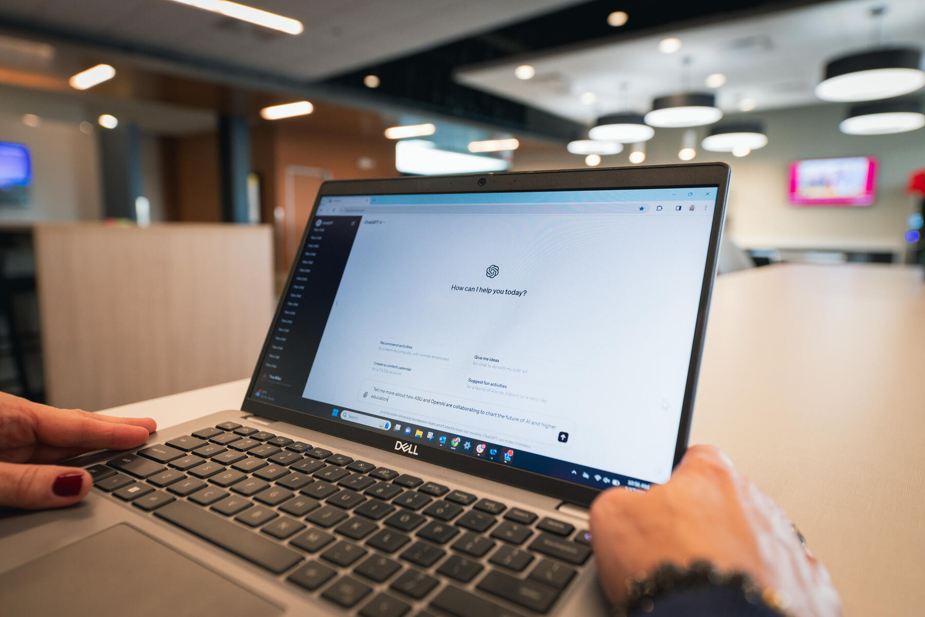Open laptop screen shows ChatGPT Enterprise at ASU