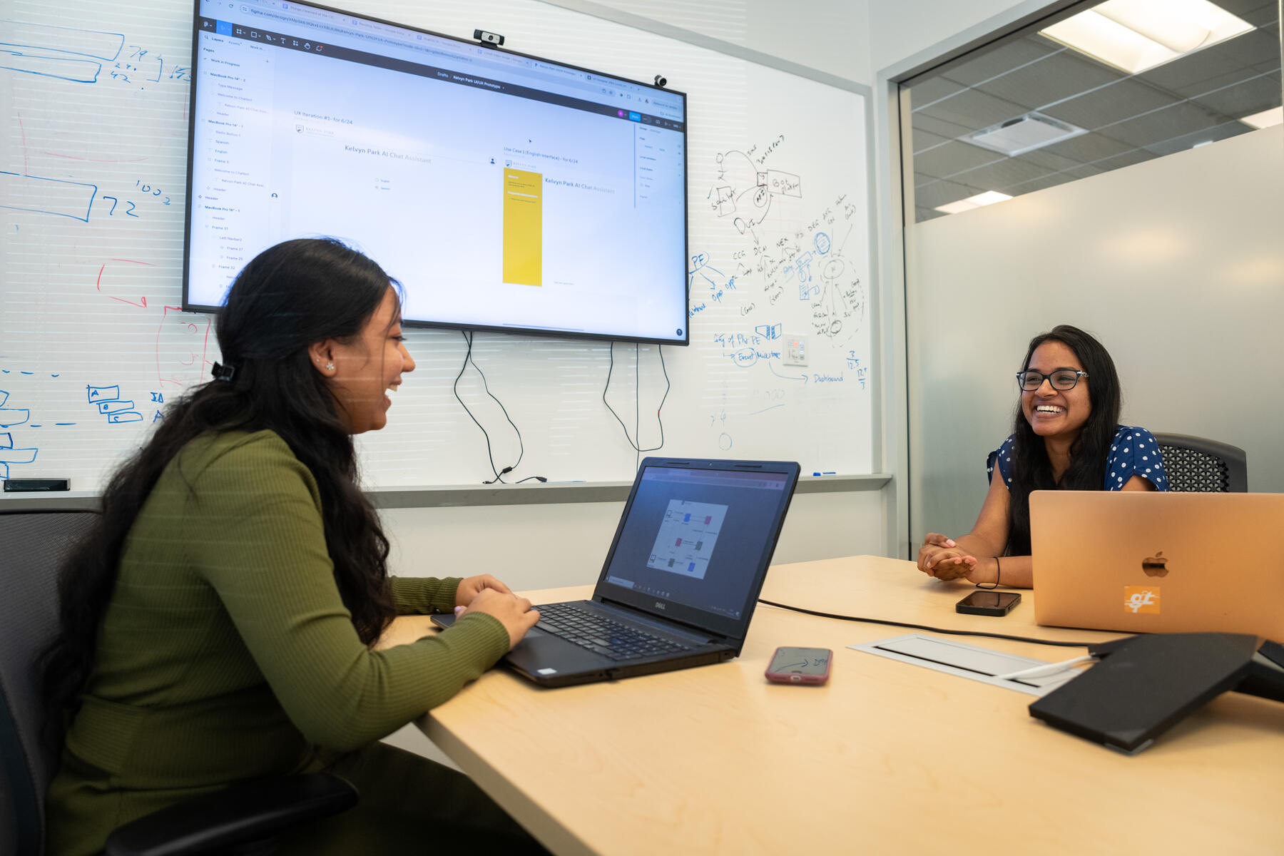 Two students on computers at ASU AI Cloud Innovation Center 